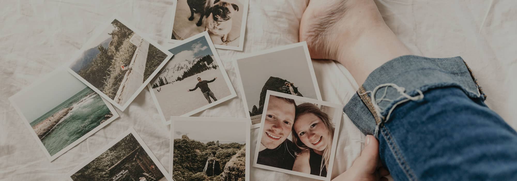 Man looking through photos whilst applying for U.S Visa